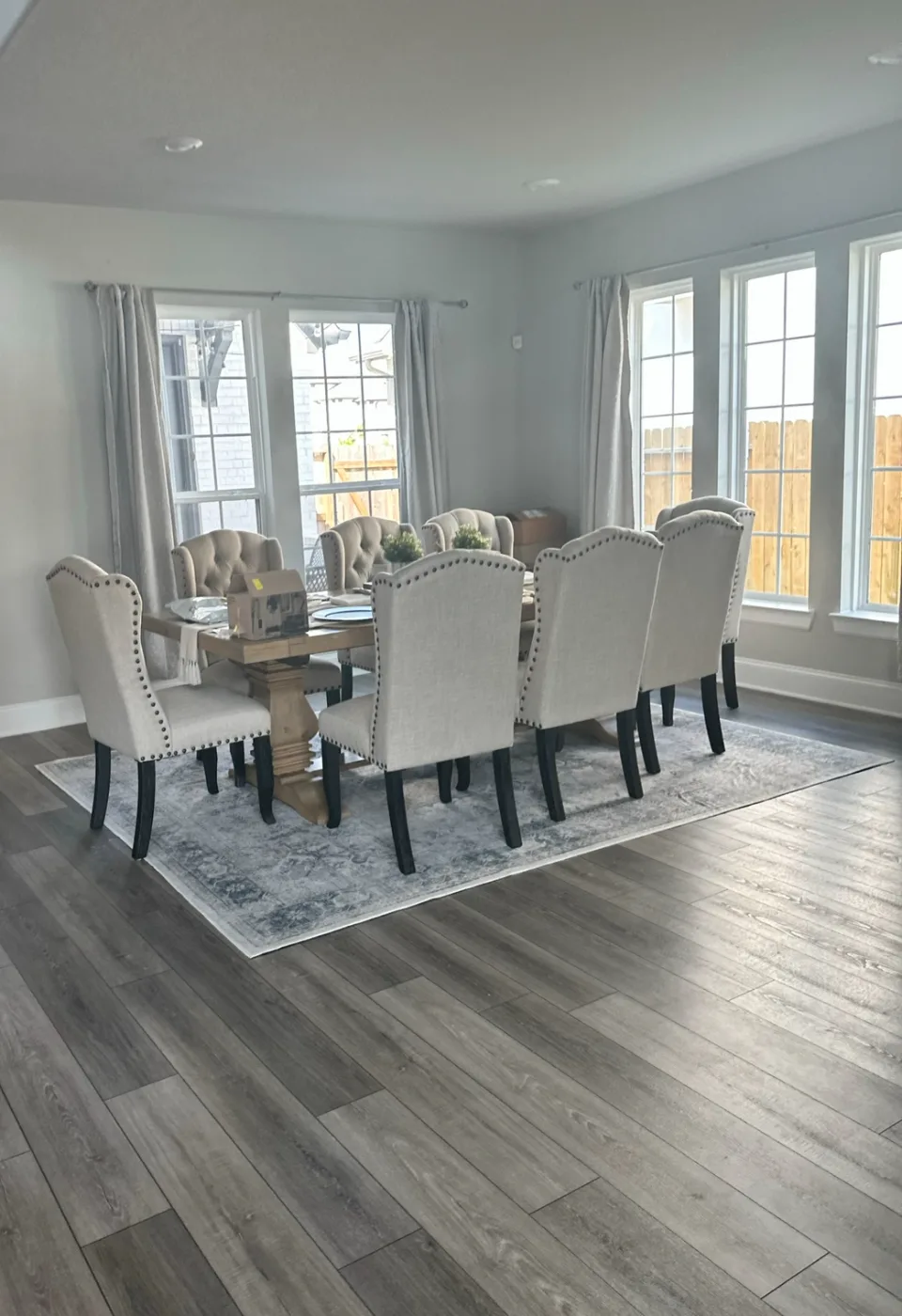 Dining room table, chairs and wood floors cleaned in a South Florida home