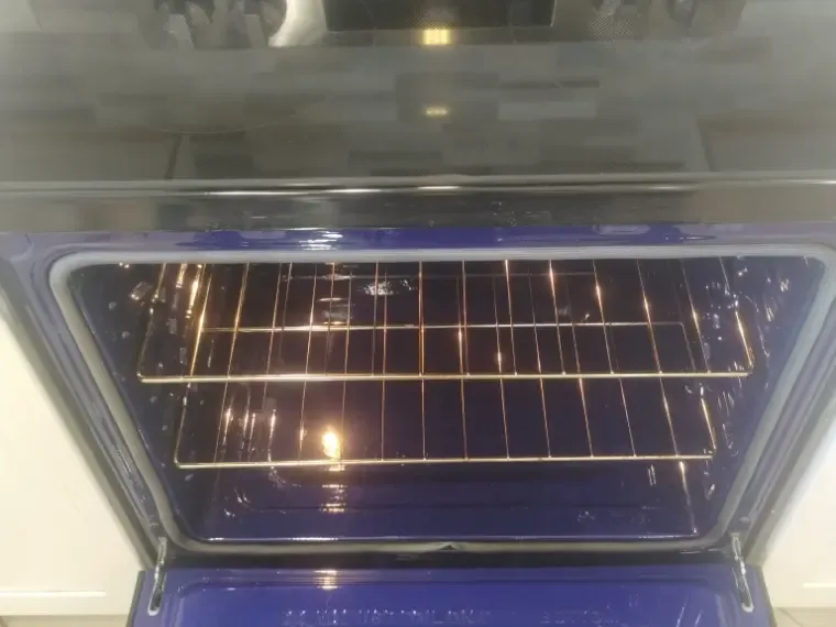 Oven interior scrubbed to bare enamel by Goals Cleaning Services